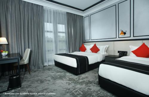 Säng eller sängar i ett rum på Stanton Hotel