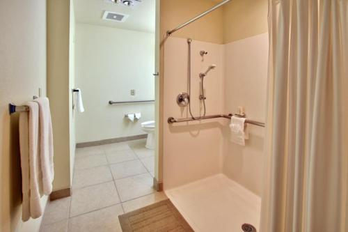 A bathroom at Western Skies Inn & Suites
