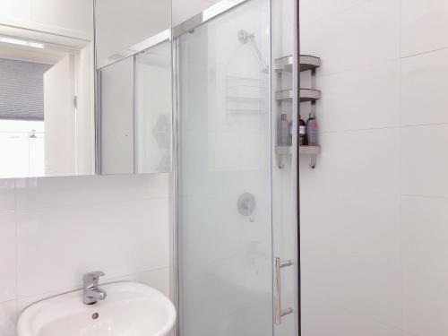 a white bathroom with a sink and a shower at Private Studio-room In Kingsford with Kitchenette and Private Bathroom Near UNSW, Randwick 5 - ROOM ONLY in Sydney