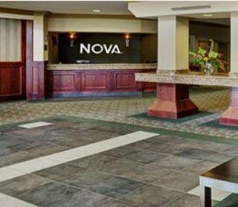 a nova sign in a lobby of a hotel at Chateau Nova Kingsway in Edmonton