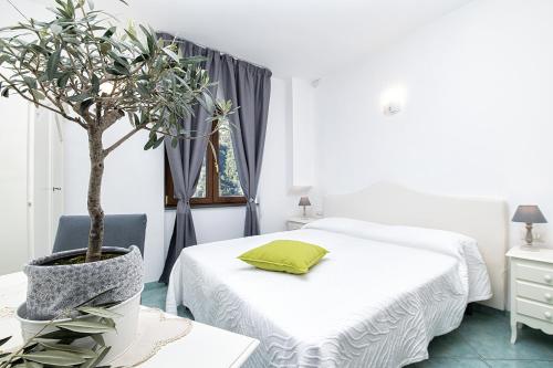 Un pat sau paturi într-o cameră la O'Lattariello