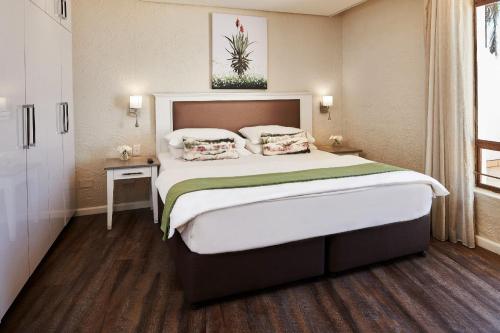 Katil atau katil-katil dalam bilik di First Group Breakers Resort - Official