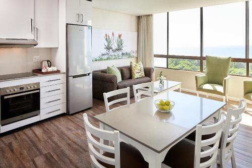 Dapur atau dapur kecil di First Group Breakers Resort - Official