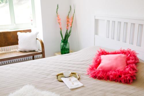 Un ou plusieurs lits dans un hébergement de l'établissement Maison BOGArT