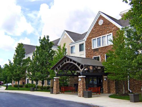 a building with a gazebo in front of it at Sonesta ES Suites Houston Galleria in Houston