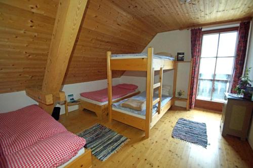 Postel nebo postele na pokoji v ubytování Straniger Alm