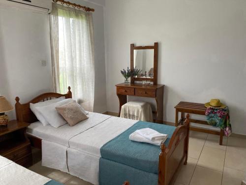 Postel nebo postele na pokoji v ubytování Seashell Apartments