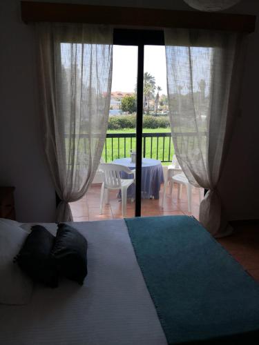 Postel nebo postele na pokoji v ubytování Seashell Apartments