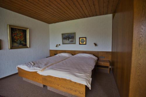 Postel nebo postele na pokoji v ubytování Haus Talblick