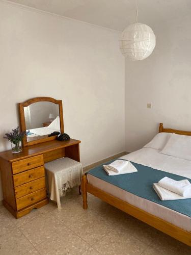 Postel nebo postele na pokoji v ubytování Seashell Apartments