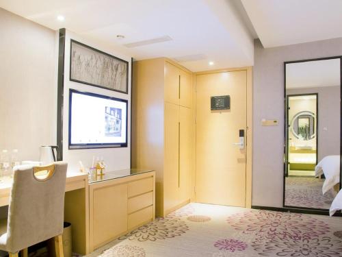 Postel nebo postele na pokoji v ubytování Lavande Hotel Dongguan Humen Square