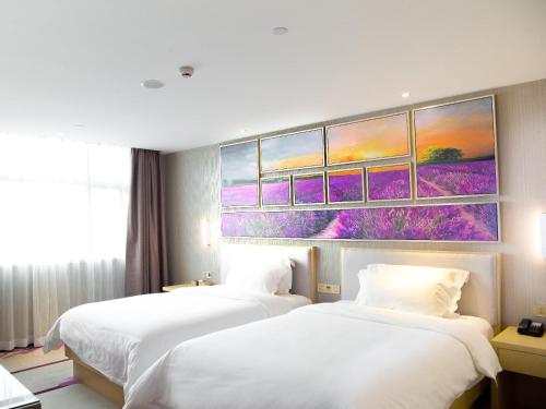 Postel nebo postele na pokoji v ubytování Lavande Hotel Dongguan Humen Square