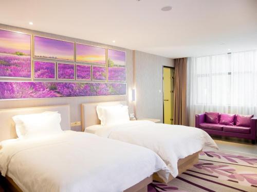 Postel nebo postele na pokoji v ubytování Lavande Hotel Dongguan Humen Square