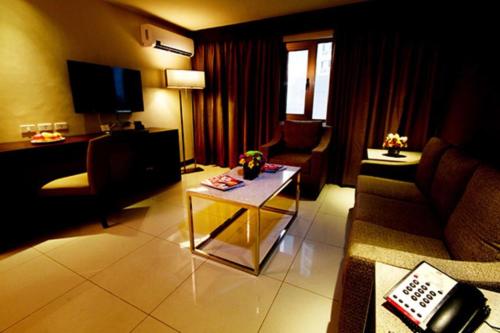 Televisyen dan/atau pusat hiburan di Mandarin Plaza Hotel