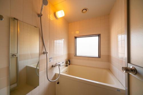 Koupelna v ubytování Hotel Miya Rikyu