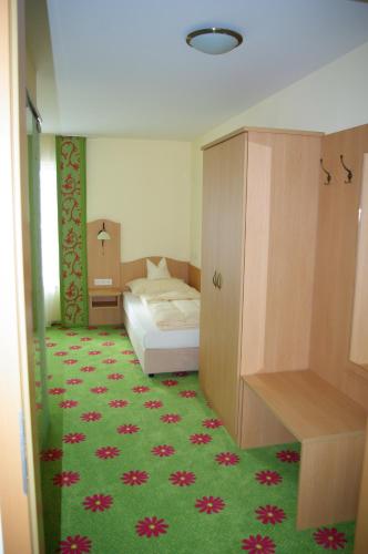 Cama o camas de una habitación en Hotel Gaum