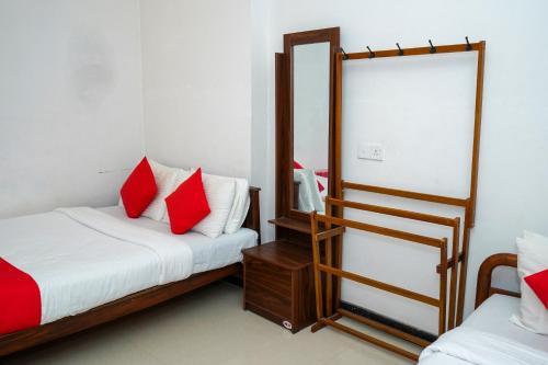 A bed or beds in a room at Kandyan Nethu Stay