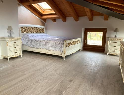 Posteľ alebo postele v izbe v ubytovaní Villa Vaccari Garda