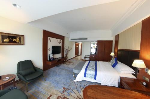 TV a/nebo společenská místnost v ubytování Gladden Hotel Jiangmen