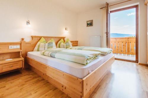 Кровать или кровати в номере Residence Speckerhof