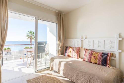 Posteľ alebo postele v izbe v ubytovaní TGH/ Malagueta paradise