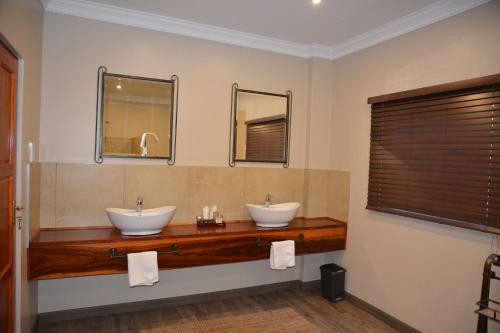 Et badeværelse på Zebra Kalahari Lodge