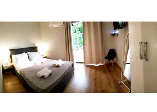 Ένα ή περισσότερα κρεβάτια σε δωμάτιο στο Emerald Dream House,Heart of the City Center