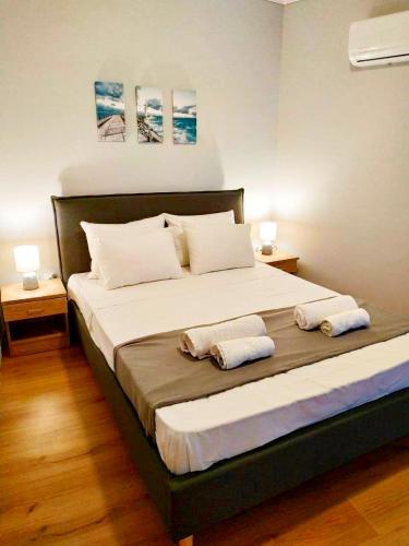 Ένα ή περισσότερα κρεβάτια σε δωμάτιο στο Emerald Dream House,Heart of the City Center