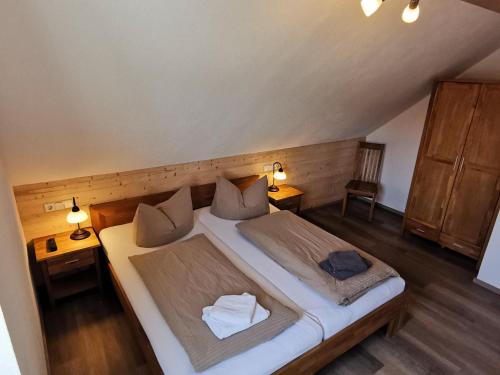 Ein Bett oder Betten in einem Zimmer der Unterkunft Apartmenthaus Vetter