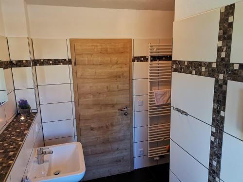 Bilik mandi di Ferienhaus Papstdorf Sächsische Schweiz 18