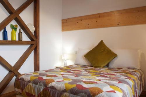 Postelja oz. postelje v sobi nastanitve Sao Jorge Apartments & Suites