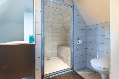 Ett badrum på Le 201-GregIMMO-Appart'Hôtel