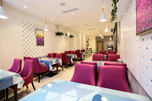 Restoran ili drugo mesto za obedovanje u objektu Lavande Hotel Jinan High-Tech Wanda Exhibition Center