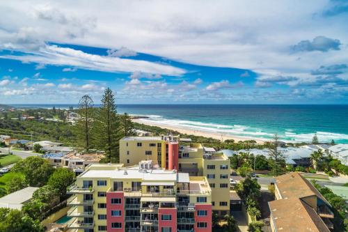 an aerial view of the beach and buildings at Grandview Apartments in Ballina