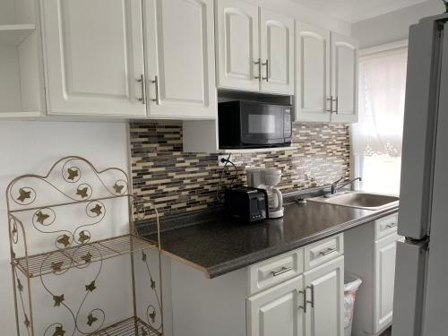 Kuchyň nebo kuchyňský kout v ubytování Nock Apartments
