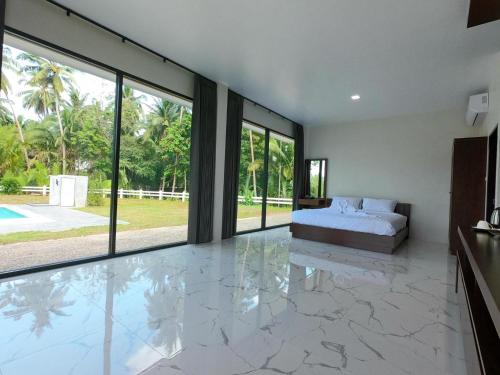 Gallery image of Suan Son Villa Koh Sa Nher สวนสนธิ์วิลล่า เกาะเสนอ SHA in Surat Thani