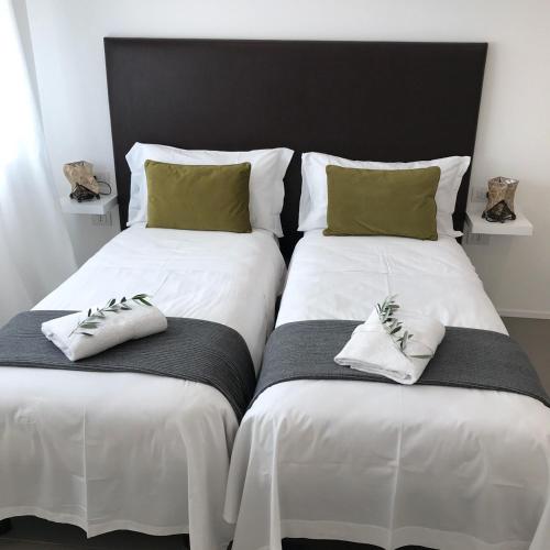 Ένα ή περισσότερα κρεβάτια σε δωμάτιο στο Casa 32