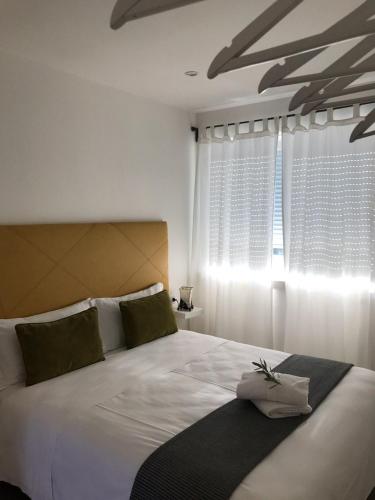 Ένα ή περισσότερα κρεβάτια σε δωμάτιο στο Casa 32