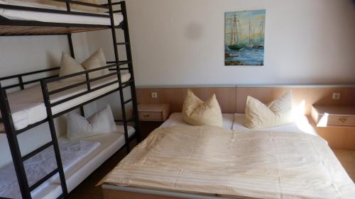 Postel nebo postele na pokoji v ubytování Ferienpark Bernstein