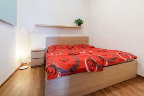 Boží Apartmány I tesisinde bir odada yatak veya yataklar