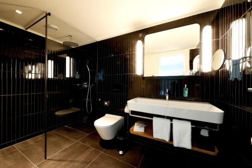 Un baño de Best Western Plus Hotel Bern