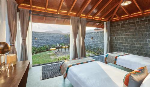 Postel nebo postele na pokoji v ubytování Viveda Wellness Resort