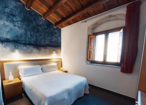 Posteľ alebo postele v izbe v ubytovaní Giardino Sul Duomo