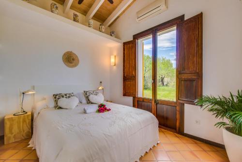 Voodi või voodid majutusasutuse Ideal Property Mallorca - Can Flauta toas