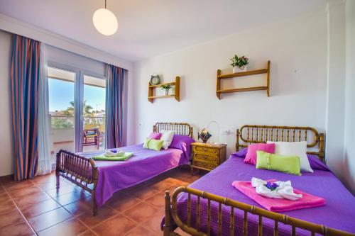 Posteľ alebo postele v izbe v ubytovaní Ideal Property Mallorca - Angelo