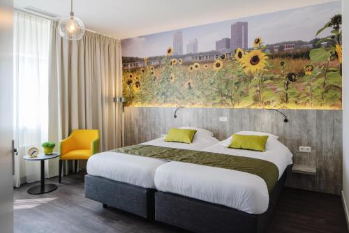 Postel nebo postele na pokoji v ubytování ibis Styles Almere