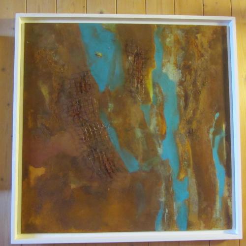 a painting in a frame on a wall at Pension Staldacher in Hasliberg