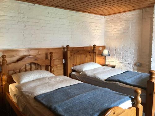 Postel nebo postele na pokoji v ubytování Mogue's Cottage at Wells House & Gardens
