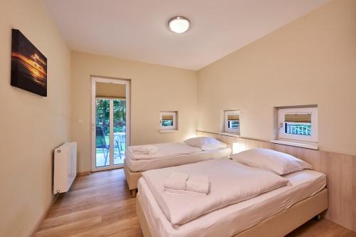 Katil atau katil-katil dalam bilik di Haus Scharhoern_Riff _ Fewo 15