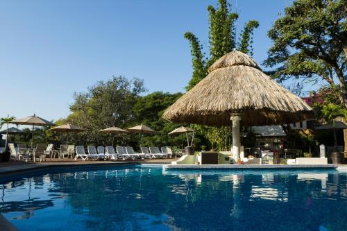 Bazén v ubytovaní Hotel Villa del Conquistador alebo v jeho blízkosti